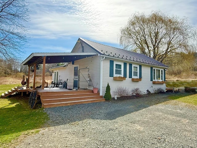 exterior space with metal roof