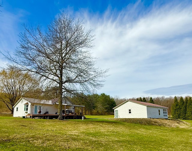 view of yard with a deck