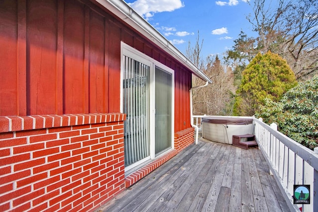 deck with a hot tub