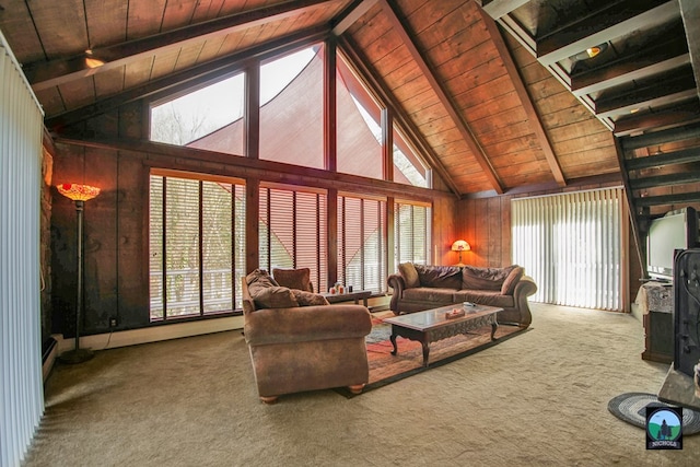 living room with high vaulted ceiling, wooden ceiling, wooden walls, carpet floors, and beamed ceiling