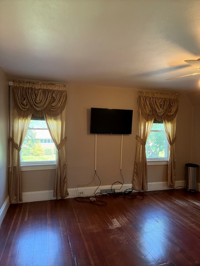 922 W Lockhart St, Sayre, PA 18840 - unfurnished living room with wood-type flooring and ceiling fan