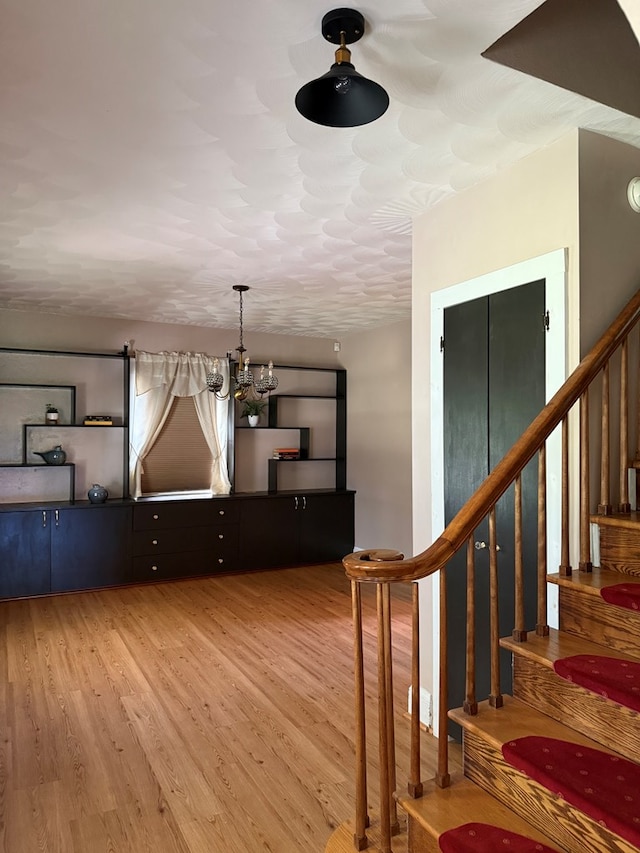 922 W Lockhart St, Sayre, PA 18840 - unfurnished dining area with stairway and wood finished floors