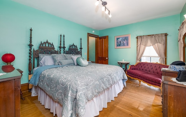 bedroom featuring wood-type flooring