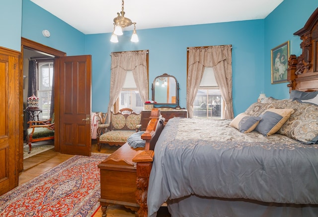 bedroom featuring multiple windows