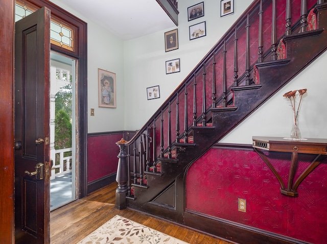 entrance foyer featuring dark hardwood / wood-style floors