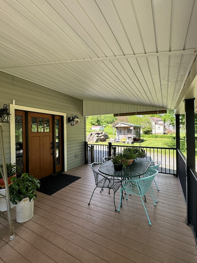 wooden deck featuring a porch