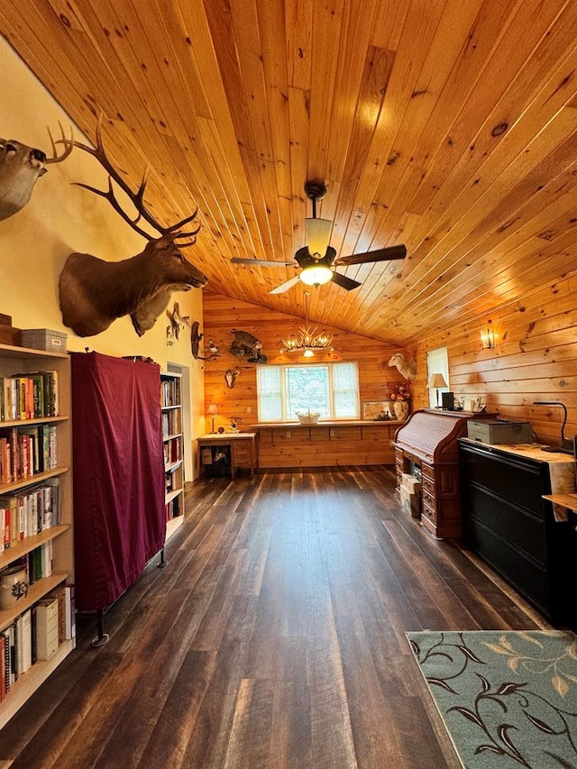 additional living space with ceiling fan, dark wood-type flooring, wooden ceiling, lofted ceiling, and wooden walls