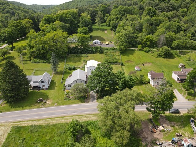 view of yard featuring an outdoor structure and a carport