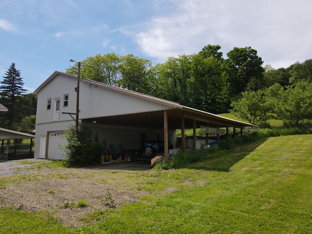 view of property exterior with a lawn and a garage