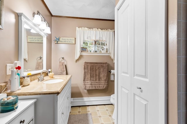 bathroom with toilet, ornamental molding, baseboard heating, vanity, and a closet