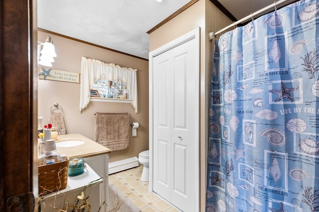 bathroom featuring toilet, ornamental molding, baseboard heating, vanity, and a closet