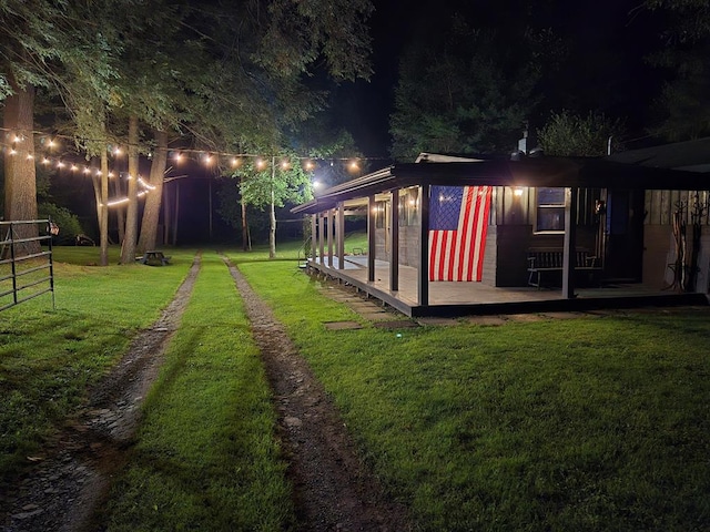 view of yard at twilight