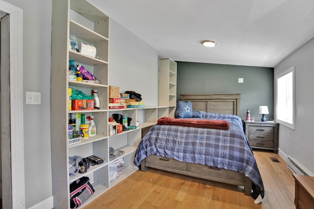 658 Ashley Hill Rd, Mansfield, PA 16933 - bedroom with wood finished floors and baseboard heating
