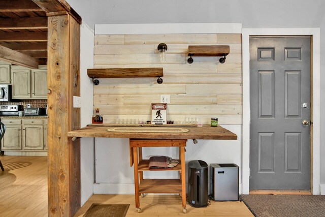 658 Ashley Hill Rd, Mansfield, PA 16933 - detailed view of green cabinets, light wood finished floors, beamed ceiling, appliances with stainless steel finishes, and open shelves