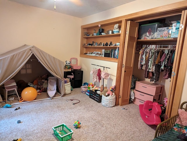 carpeted bedroom featuring a closet