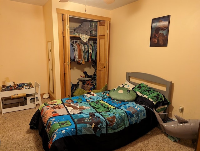 bedroom with carpet flooring and a closet