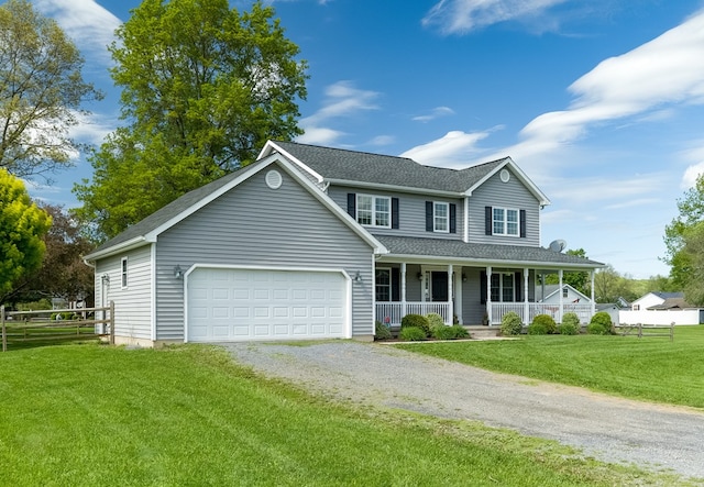 113 W Woodlawn Ave, Elkland, PA 16920 - view of front of house featuring a porch, driveway, a garage, and a shingled roof