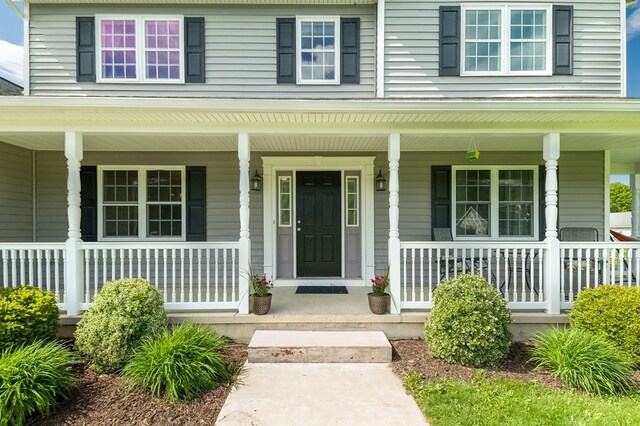 113 W Woodlawn Ave, Elkland, PA 16920 - view of exterior entry with covered porch