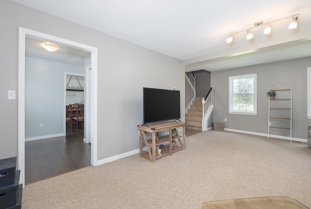 113 W Woodlawn Ave, Elkland, PA 16920 - carpeted living room with stairway, baseboards, and wood finished floors