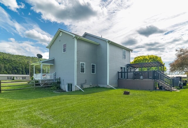 113 W Woodlawn Ave, Elkland, PA 16920 - rear view of property featuring a pergola, a wooden deck, stairway, and cooling unit
