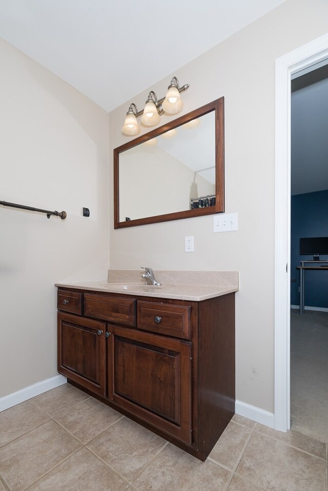 113 W Woodlawn Ave, Elkland, PA 16920 - bathroom featuring vanity, baseboards, and tile patterned floors