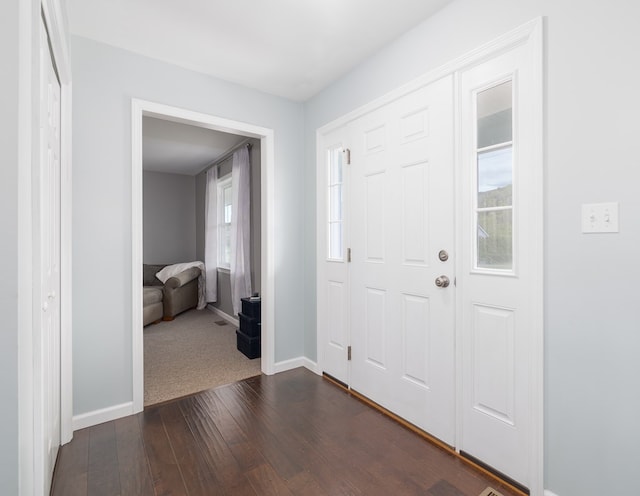 113 W Woodlawn Ave, Elkland, PA 16920 - foyer entrance with dark wood-style flooring and baseboards