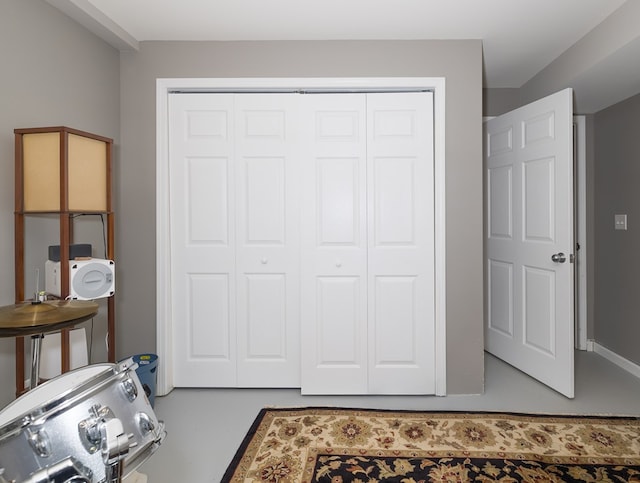 113 W Woodlawn Ave, Elkland, PA 16920 - bedroom featuring a closet and finished concrete flooring