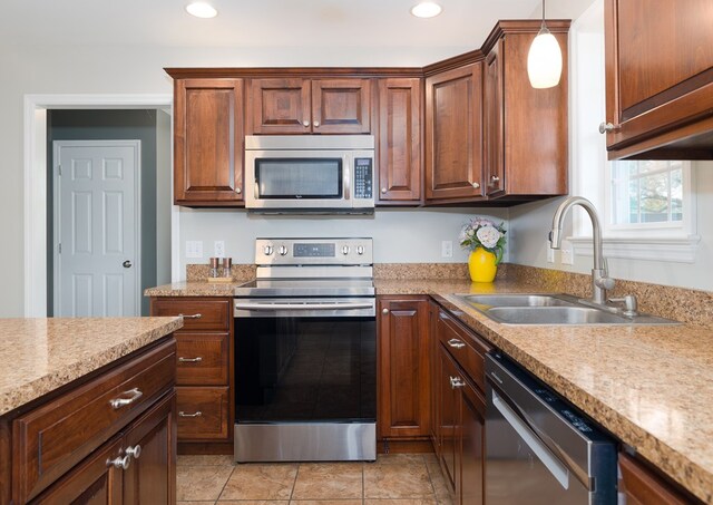 113 W Woodlawn Ave, Elkland, PA 16920 - kitchen featuring appliances with stainless steel finishes, a sink, light countertops, decorative light fixtures, and recessed lighting