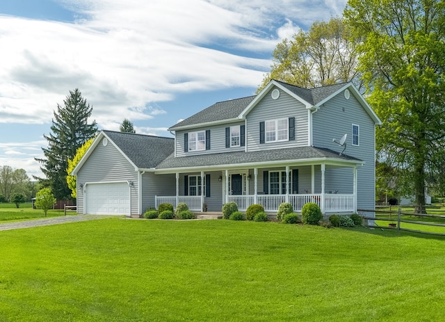 113 W Woodlawn Ave, Elkland, PA 16920 - view of front of property with covered porch, driveway, a garage, and a shingled roof