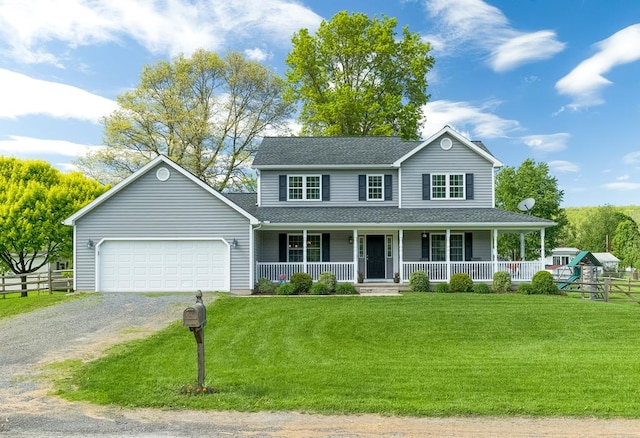 113 W Woodlawn Ave, Elkland, PA 16920 - view of front facade featuring a porch, driveway, an attached garage, and roof with shingles