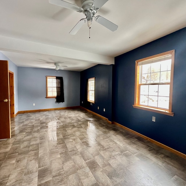 spare room featuring ceiling fan