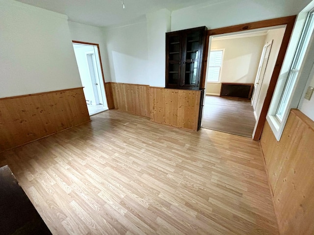 spare room featuring light wood-type flooring