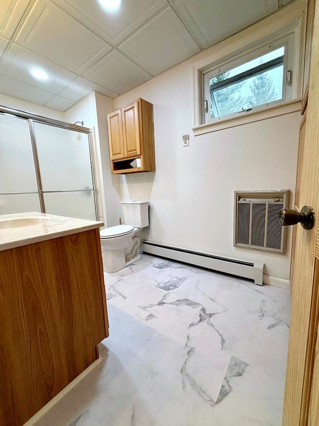 bathroom with a wall mounted air conditioner, walk in shower, vanity, a baseboard radiator, and toilet