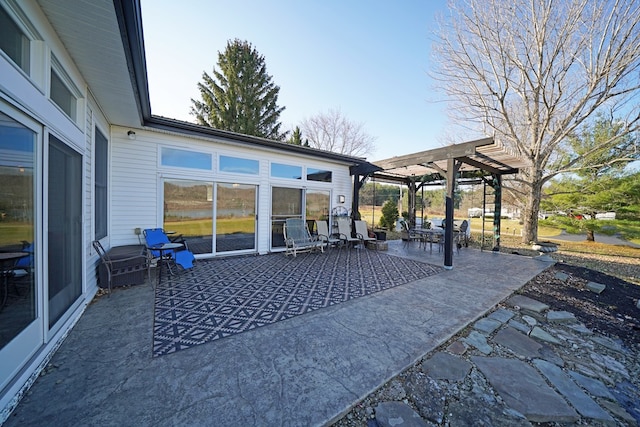 view of patio featuring a pergola