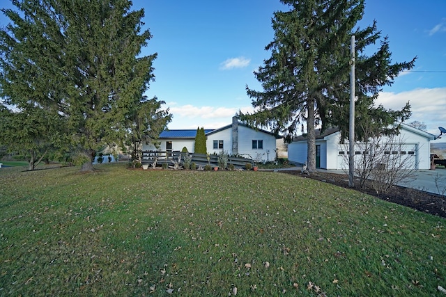 view of yard featuring a garage