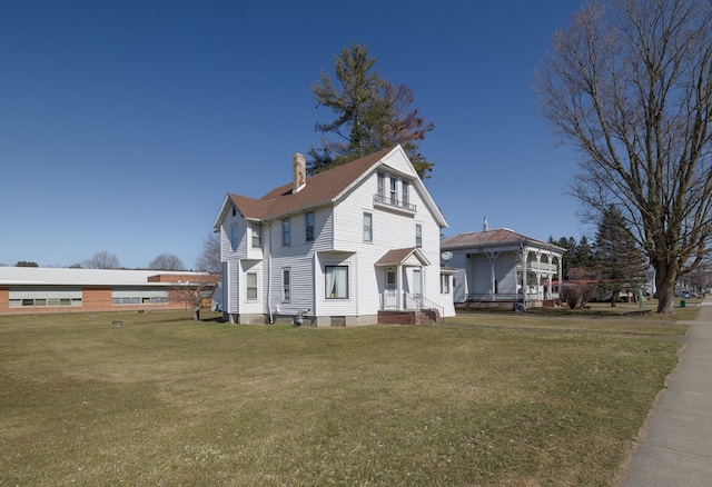 view of front of home featuring a front yard