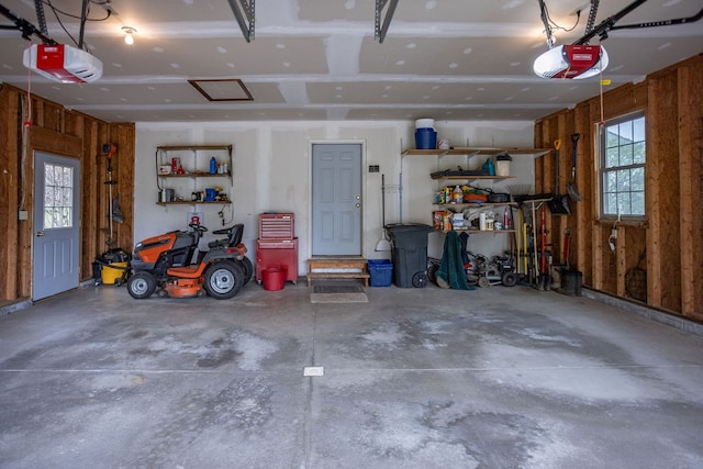 garage featuring a garage door opener