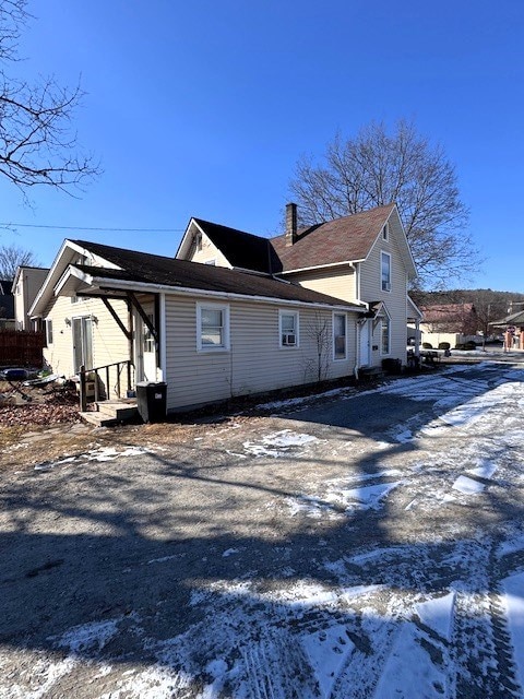 view of snow covered property