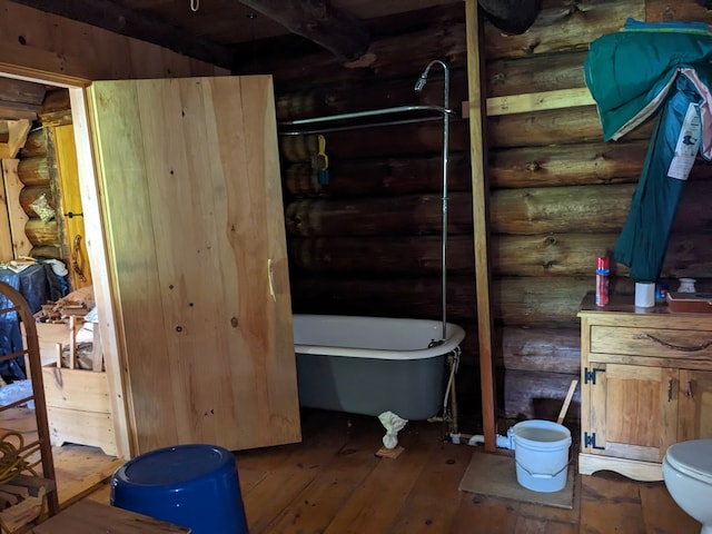 480 Bowers Rd, Coudersport, PA 16915 - bathroom with log walls, a soaking tub, wood-type flooring, and a shower