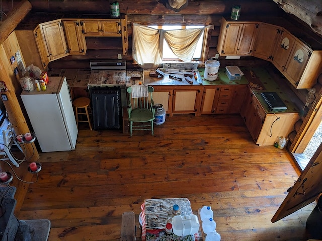 480 Bowers Rd, Coudersport, PA 16915 - kitchen with hardwood / wood-style flooring and freestanding refrigerator