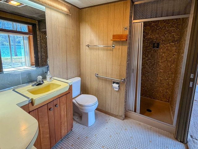 986 Wesauking Dr, Towanda, PA 18848 - full bath with a shower stall, vanity, toilet, tile patterned flooring, and wooden walls