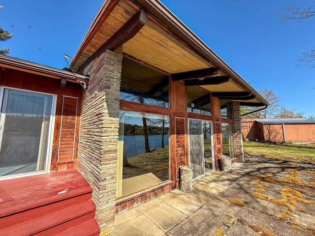 986 Wesauking Dr, Towanda, PA 18848 - doorway to property featuring board and batten siding and a water view