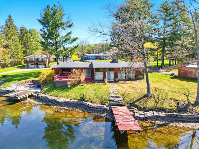 986 Wesauking Dr, Towanda, PA 18848 - rear view of property with a lawn and a water view