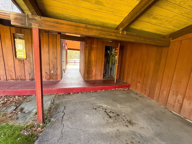 986 Wesauking Dr, Towanda, PA 18848 - interior space with wood walls, wood ceiling, beam ceiling, and concrete flooring
