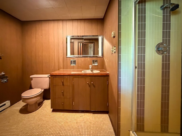 986 Wesauking Dr, Towanda, PA 18848 - bathroom featuring toilet, a stall shower, vanity, wooden walls, and a baseboard radiator