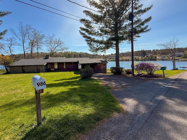 986 Wesauking Dr, Towanda, PA 18848 - ranch-style house with a water view, asphalt driveway, a front yard, and a chimney