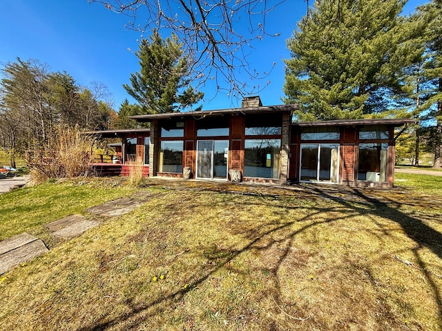 986 Wesauking Dr, Towanda, PA 18848 - rear view of house with a chimney and a lawn
