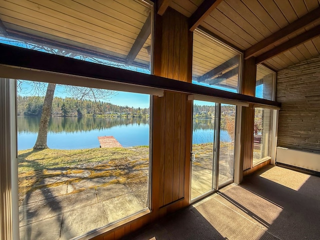 986 Wesauking Dr, Towanda, PA 18848 - entryway featuring a water view, wooden ceiling, wood walls, and carpet flooring