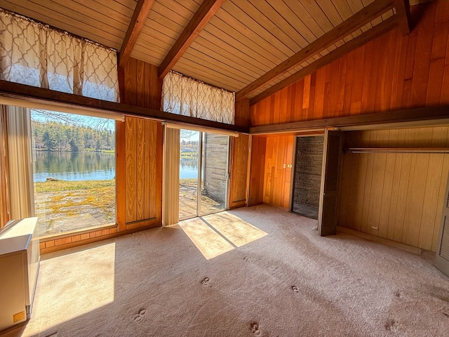 986 Wesauking Dr, Towanda, PA 18848 - unfurnished bedroom with a water view, wood walls, high vaulted ceiling, beam ceiling, and carpet