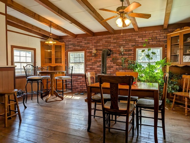 1057 Stony Fork Rd, Wellsboro, PA 16901 - dining area with wood-type flooring, beam ceiling, and a healthy amount of sunlight